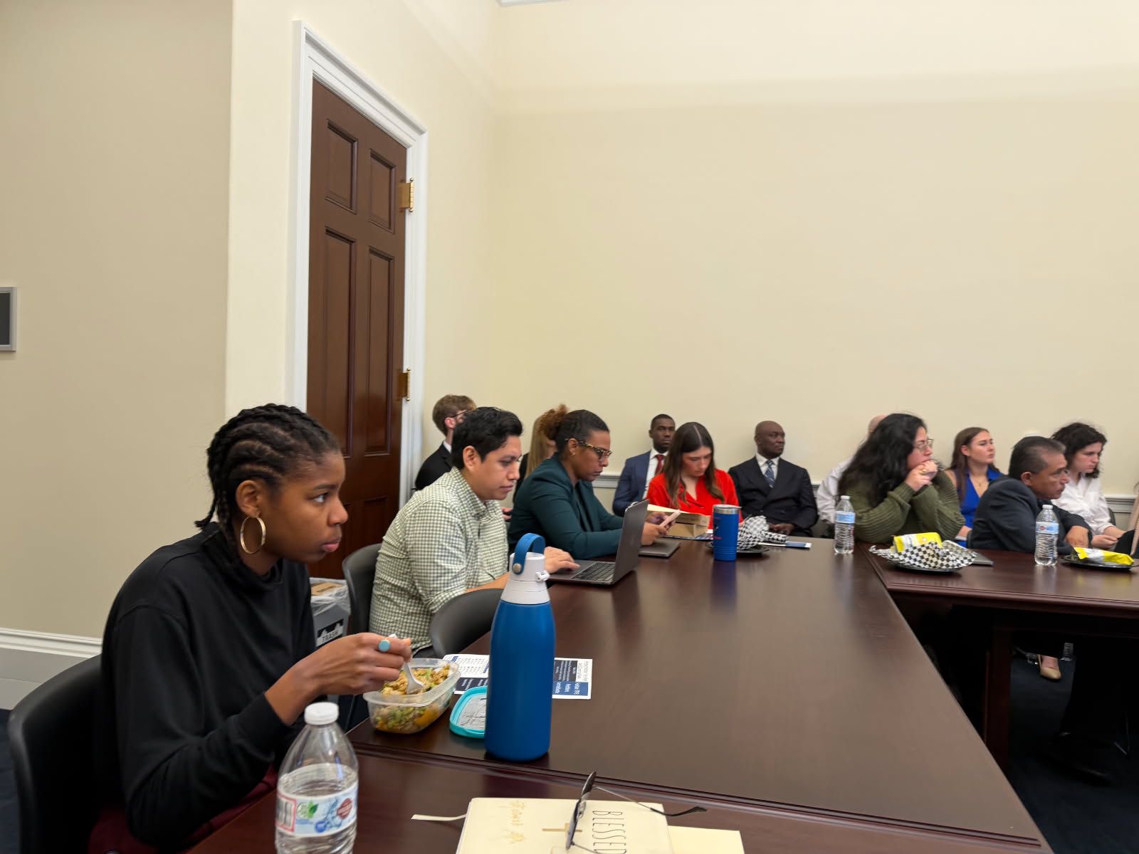Faith leaders and advocates in a congressional briefing session